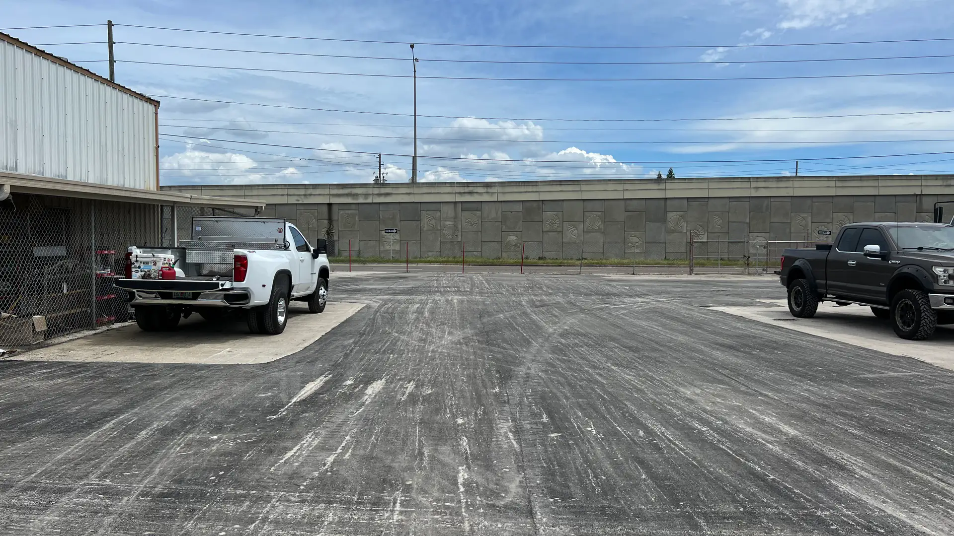 Asphalt milling in Hudson, FL: milled surface of an industrial parking lot ready for new pavement