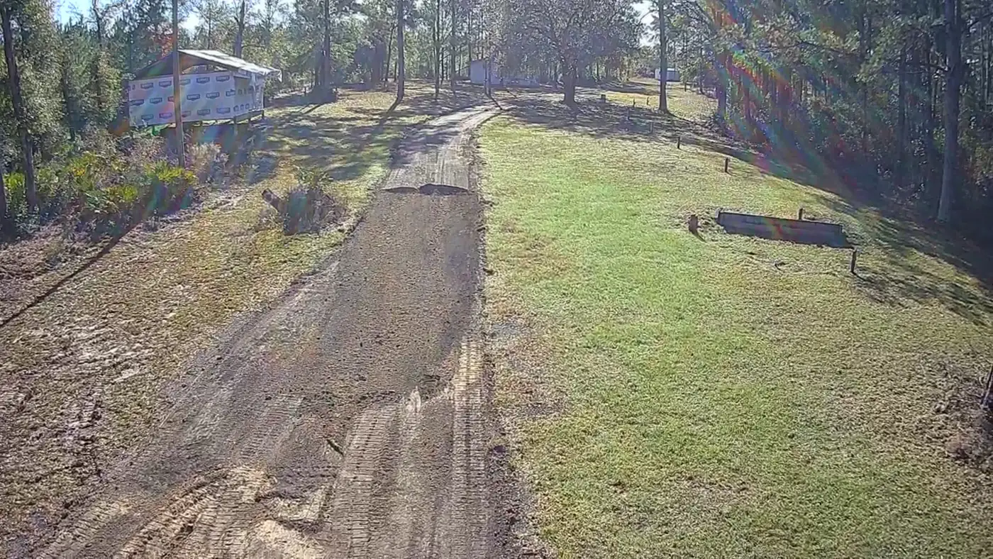Site preparation in Hudson, FL: graded and compacted base for a new residential driveway